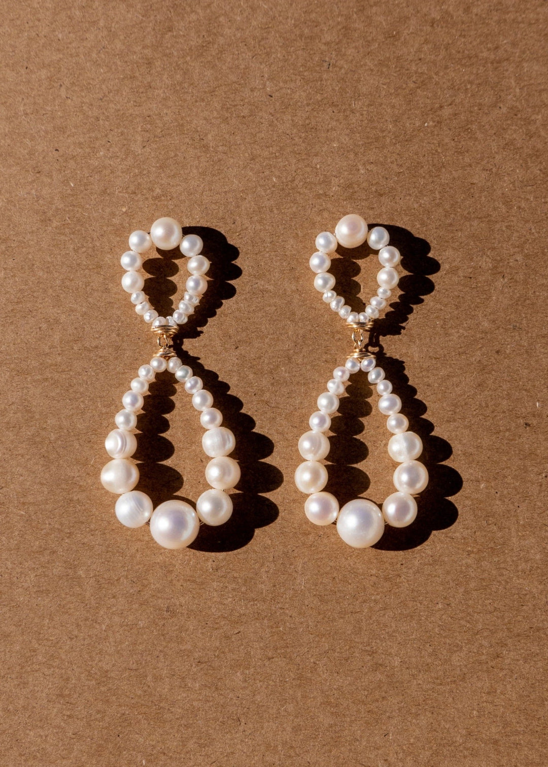Double pearl Infinity hoop earrings