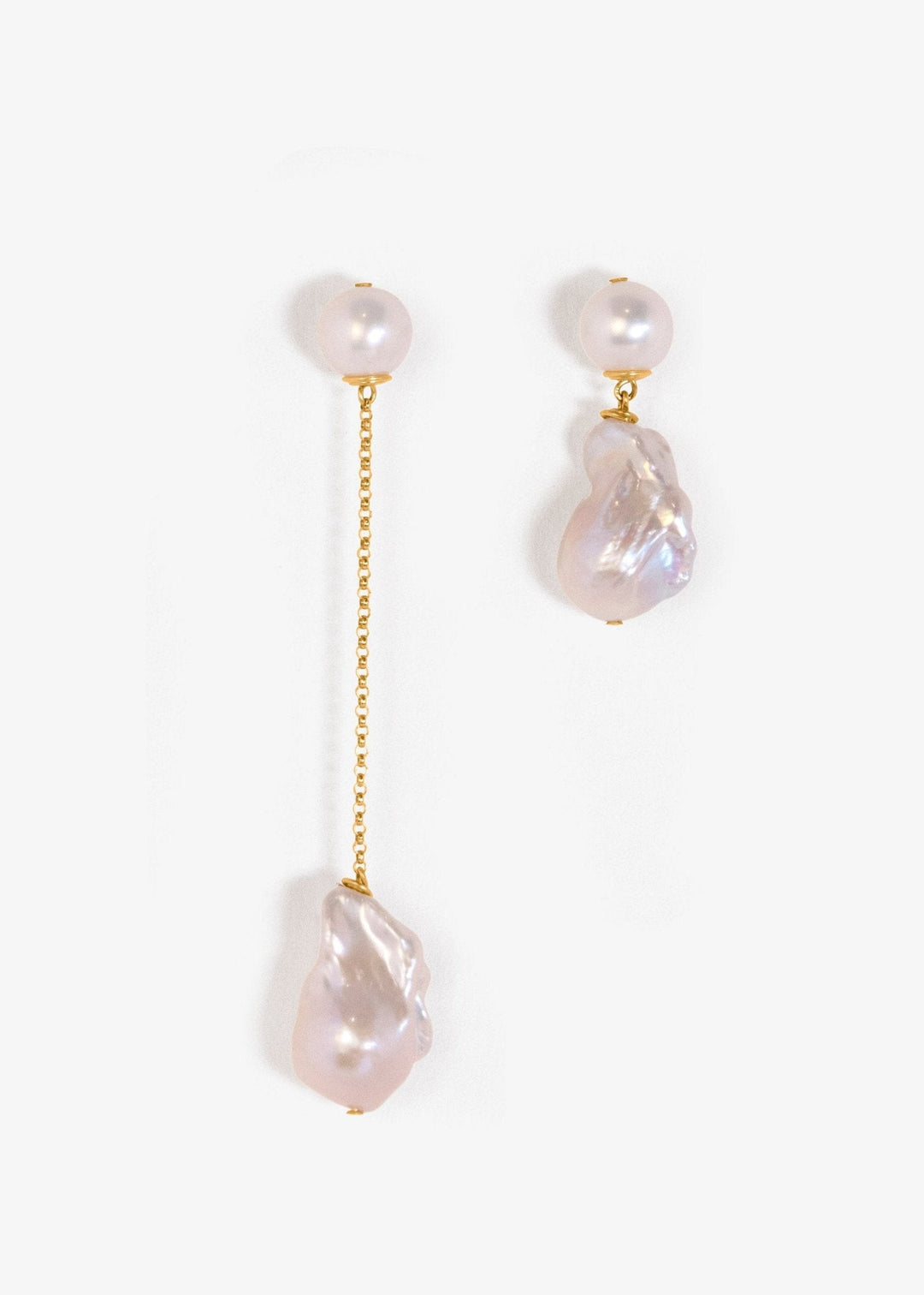 Imaan - Designed for the bride who appreciates the timeless look of pearls but seeks a touch of uniqueness, these earrings are a striking choice. Our Imaan Earrings make a stunning addition to any bridal look and are a must-have for your timeless jewelry