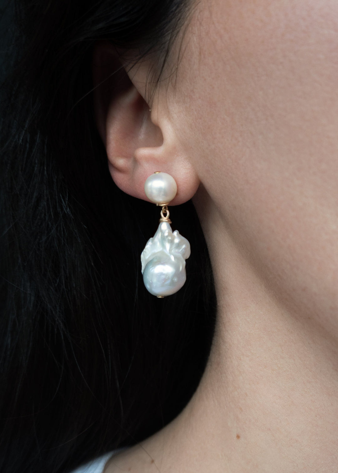 14K Imaan - Designed for the bride who appreciates the timeless look of pearls but seeks a touch of uniqueness, these earrings are a striking choice. Our Imaan Earrings make a stunning addition to any bridal look and are a must-have for your timeless jewe