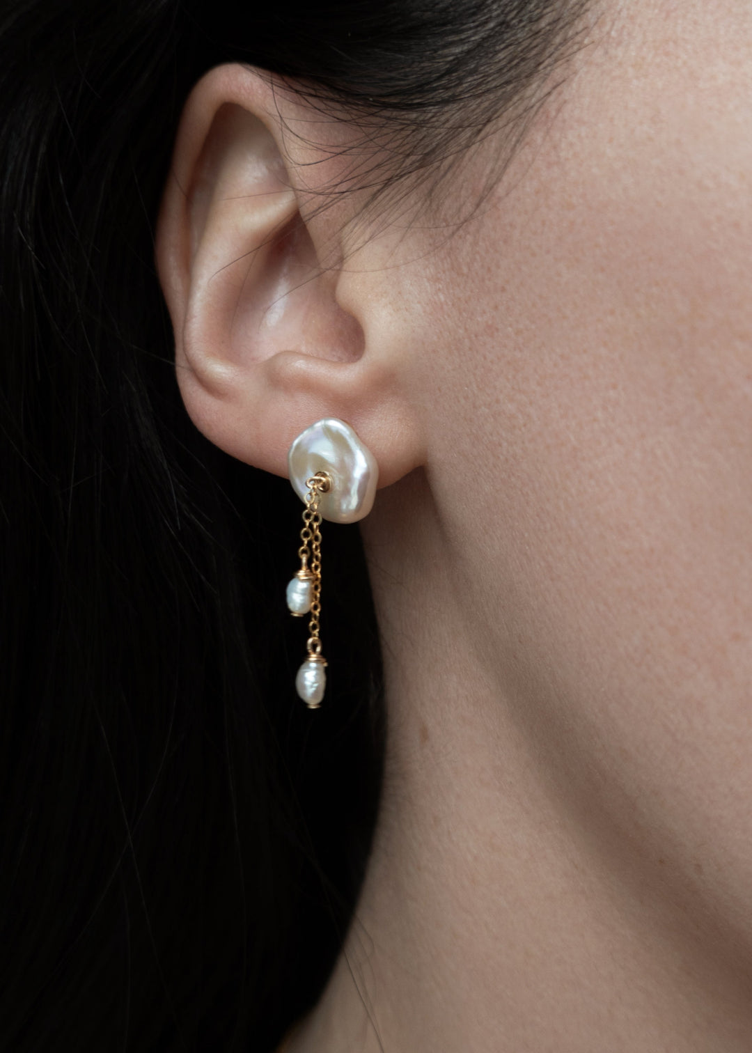 14K Lily - These earring are our sweet playful take on a calla lily. Simple enough to wear to work and fancy enough to wear to a wedding, its no wonder these are one of our top selling earrings. 14K Solid Gold Tarnish-Resistant & Hypoallergenic AAA Grade