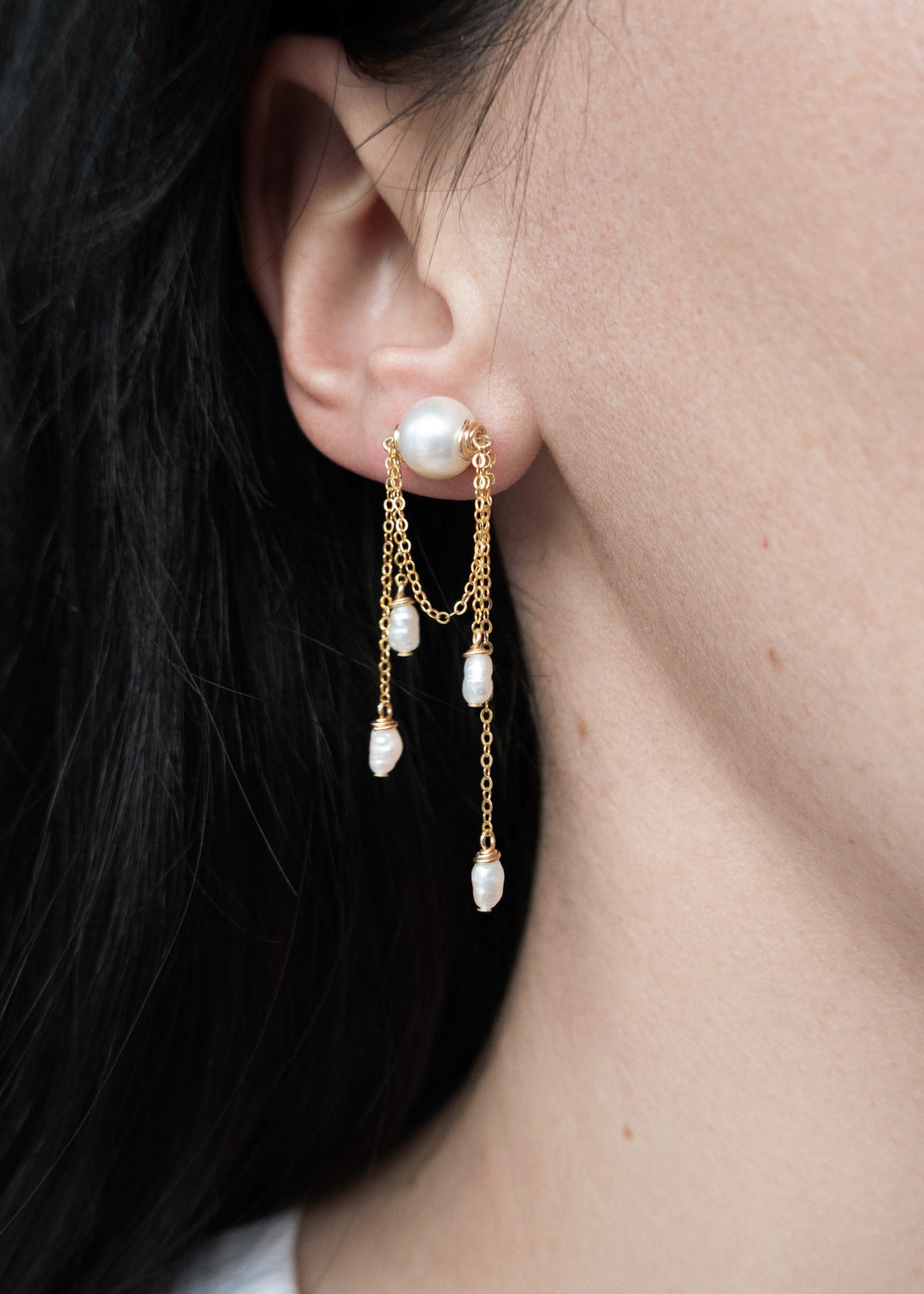 14K Luna Earrings - These earrings are unique, just like the pearls used to make them. They are sure to become future heirlooms. 14K Solid Gold Tarnish-Resistant & Hypoallergenic AAA Grade Genuine Freshwater Pearls Handmade in NJ/NY Earring Length: 2" Ple