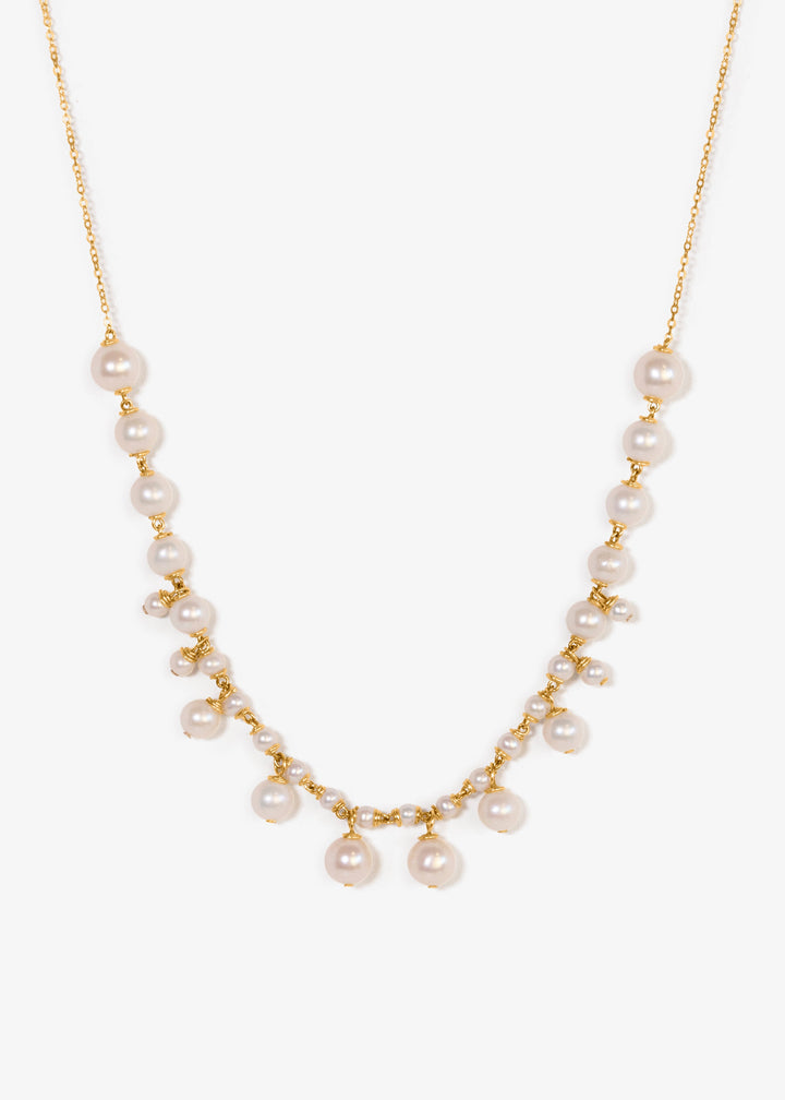 Alora - Graduated pearls flow from large to small, with delicate drops that mirror the pattern in reverse. The Alora necklace feels regal yet effortless, a modern take on classic pearl design. 14K Gold-Filled Tarnish-Resistant &amp; Hypoallergenic AAA Grade G