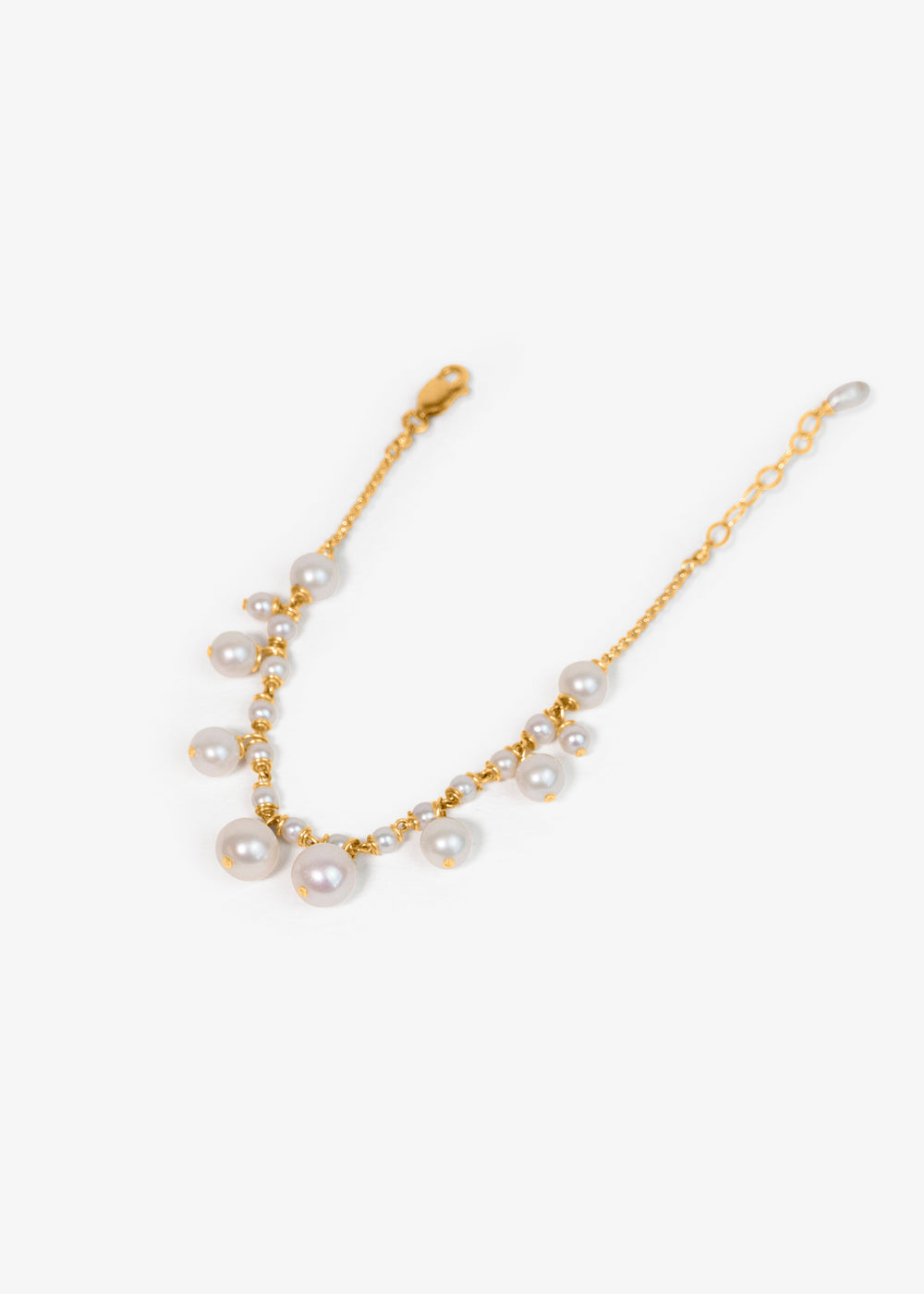Alora Bracelet - Delicate seed pearls and round Edison pearls create a bracelet full of movement and light. Each pearl shifts as you wear it, making the Alora a playful, standout piece. 14K Gold-Filled Tarnish-Resistant & Hypoallergenic AAA Grade Genuine