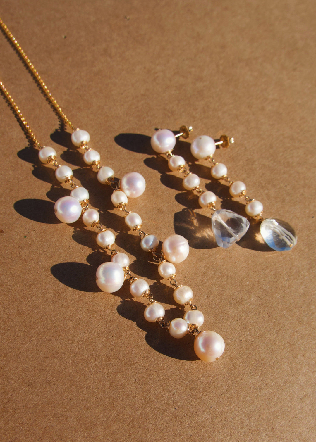 Elegant bridal earrings and necklace with pearls and crystal quartz