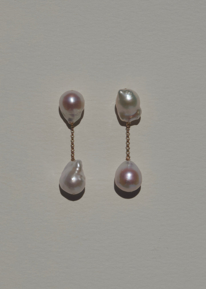 Anya earrings, vertical baroque pearl drops on a short gold chain