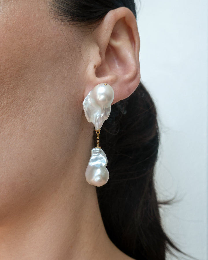 Aria earrings worn on a model&
