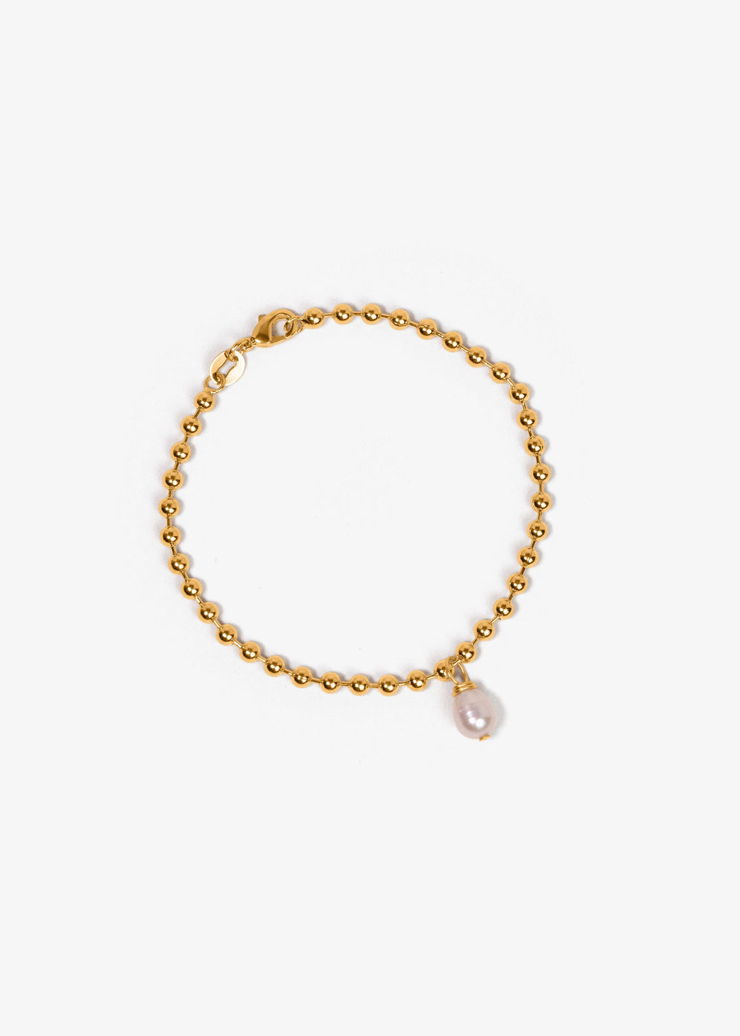 Elegant bracelet adorned with gold beads and a pearl pendant