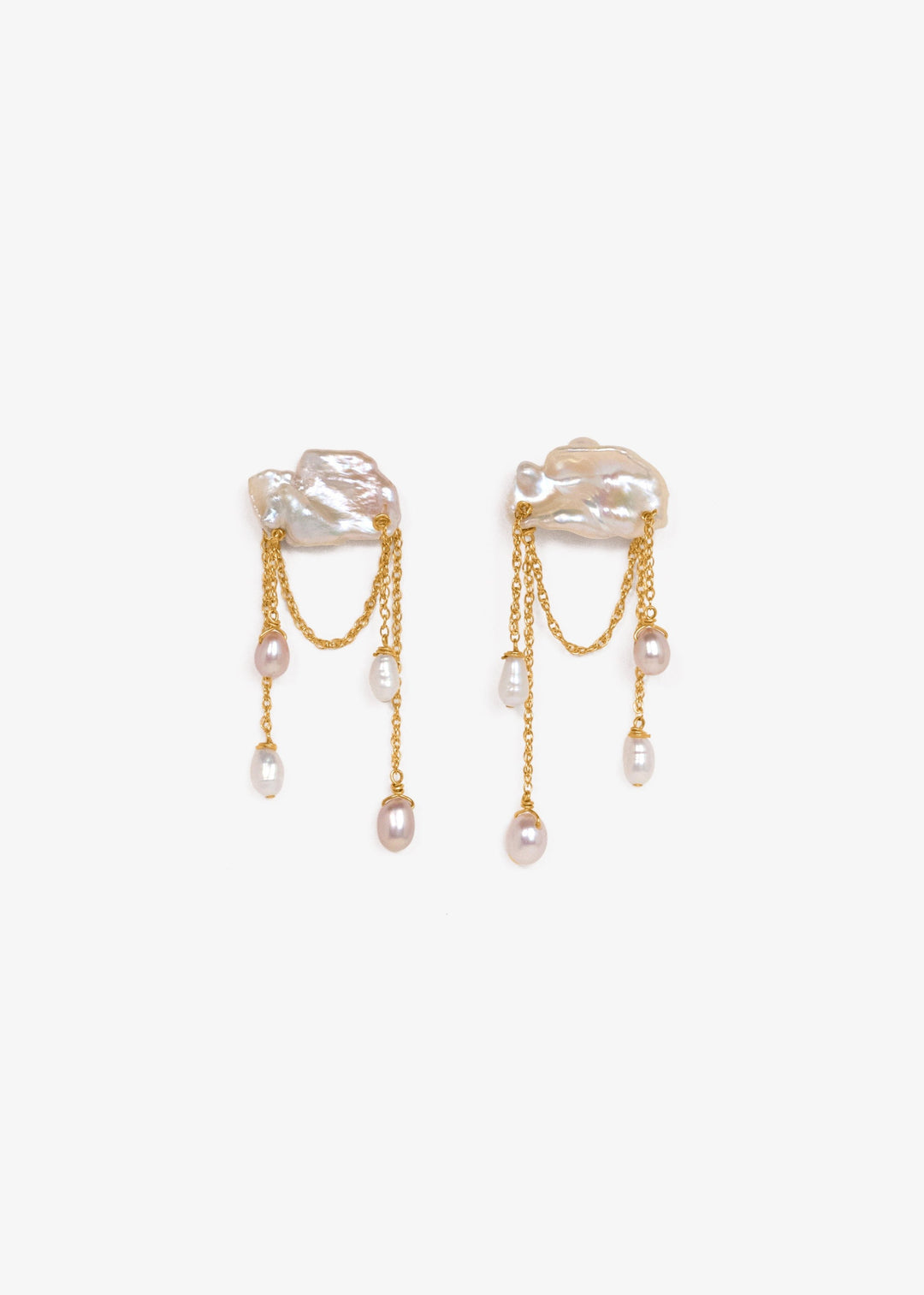 Stunning earrings featuring keshi and baroque pearls with gold chain