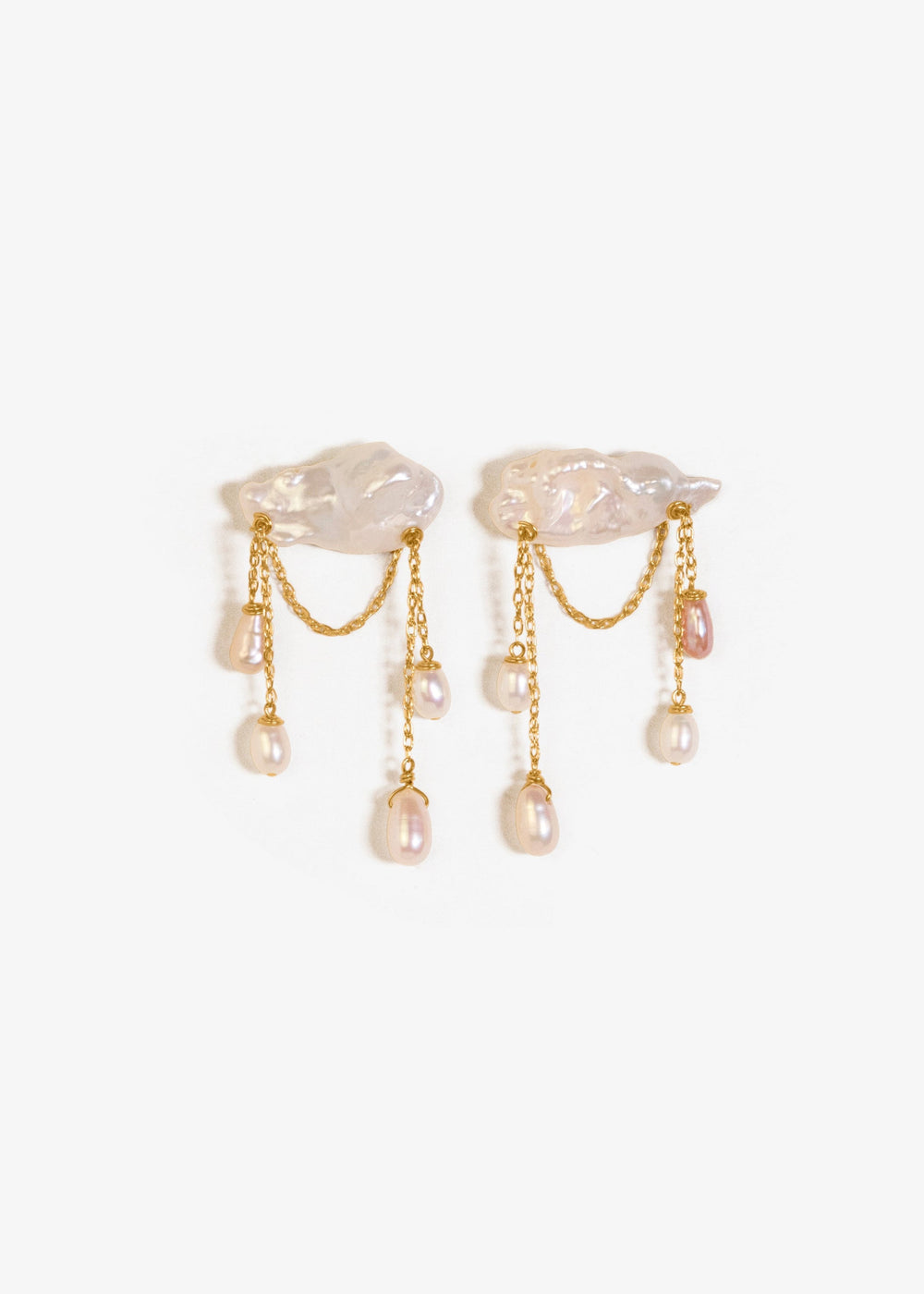 Stunning earrings featuring keshi and baroque pearls with gold chain