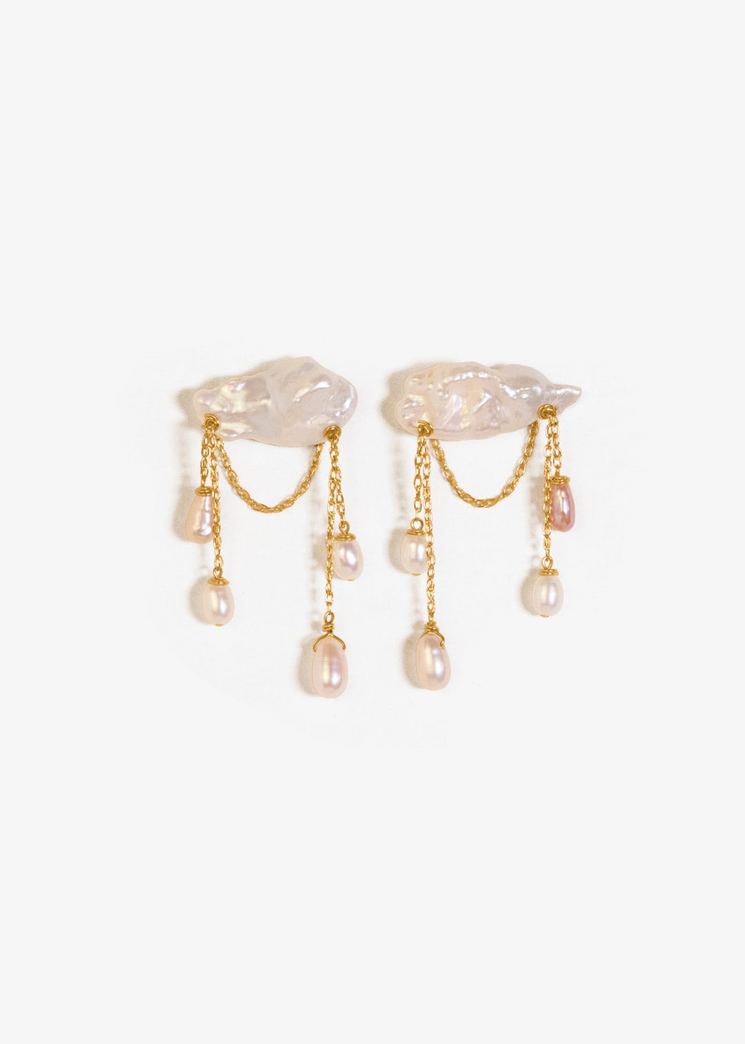 Stunning earrings featuring keshi and baroque pearls with gold chain