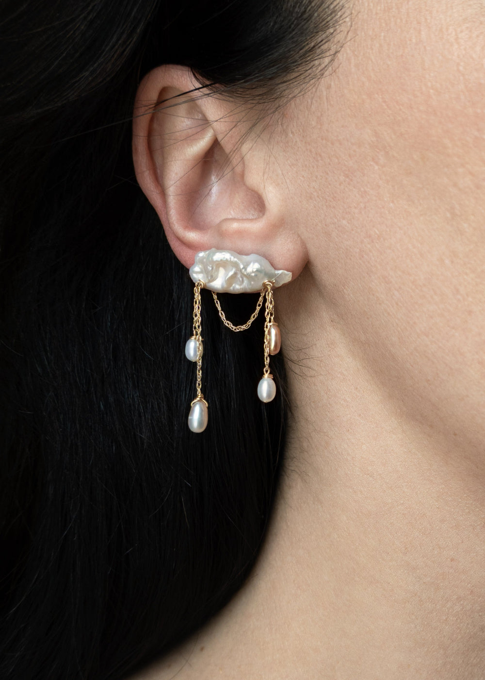 Stunning earring featuring keshi and baroque pearls with gold chain