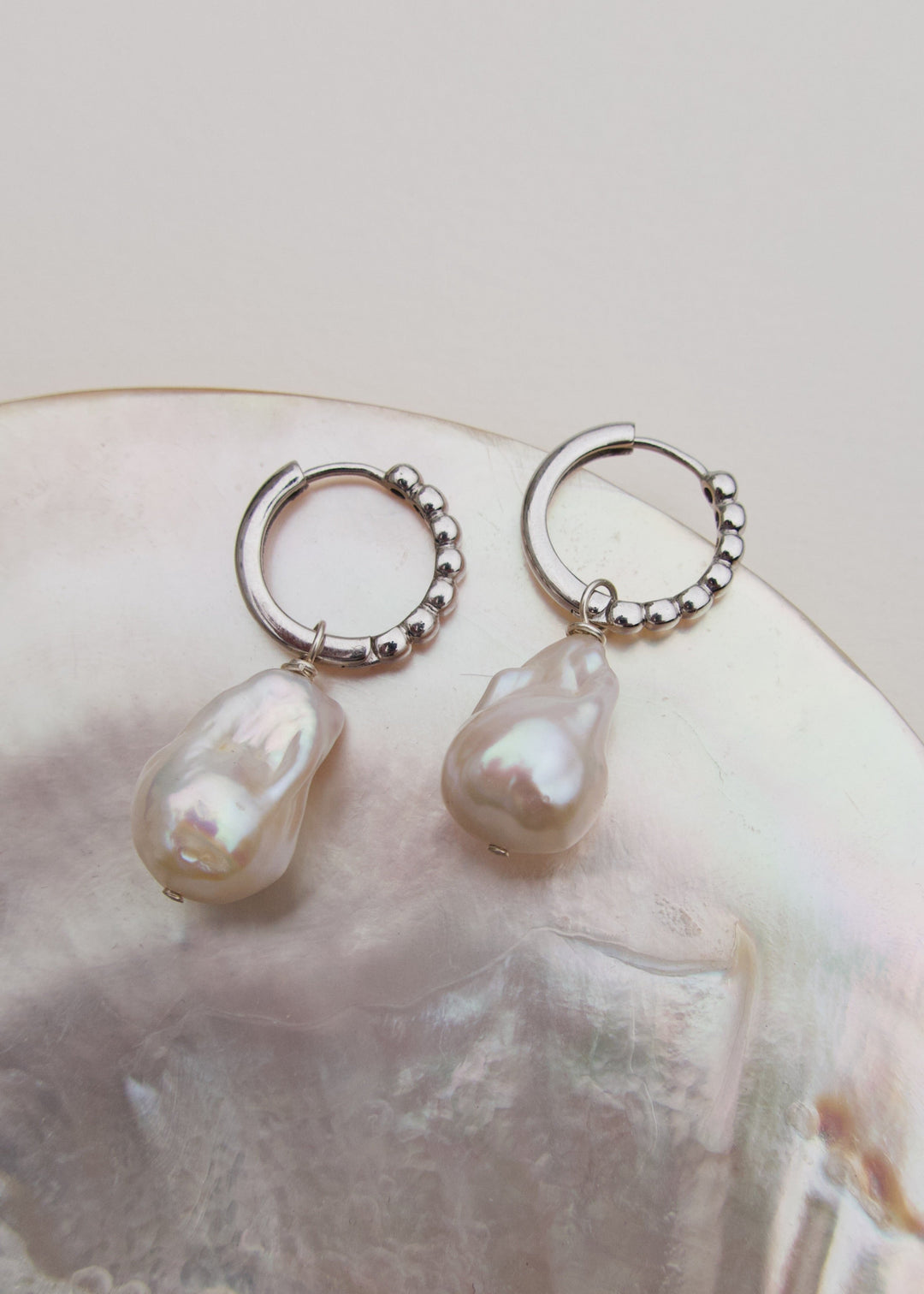 Sterling silver earrings with a large pearl