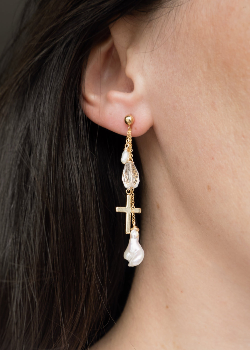 Earrings adorned with gold cross, glass beads, keshi and baroque pearls