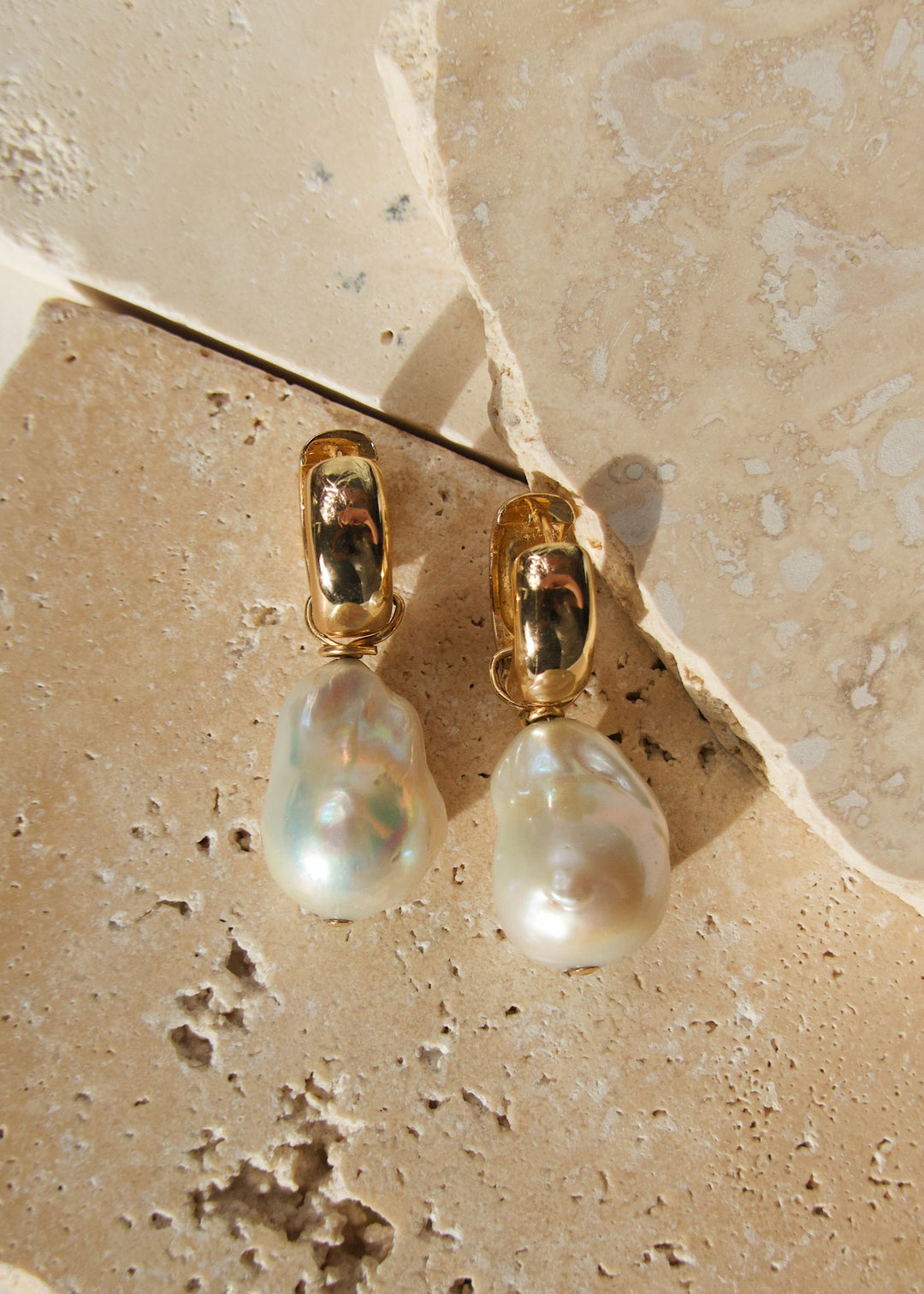 Gold-filled earrings with a large baroque pearl