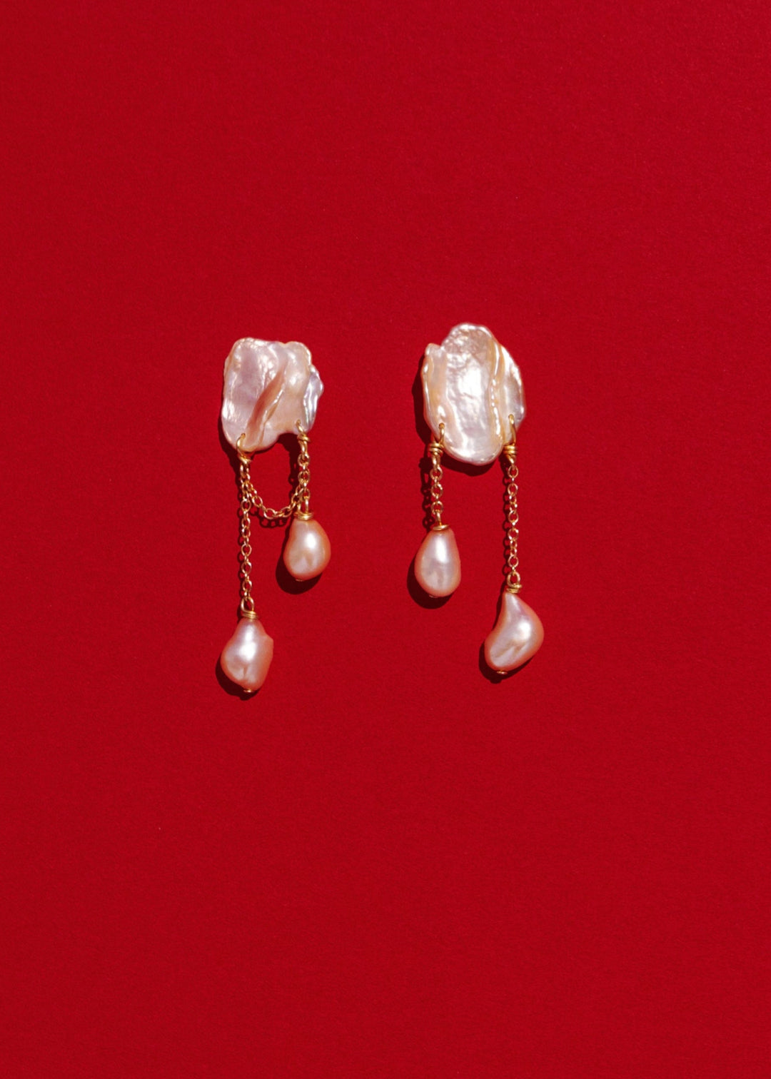 Solid gold earrings with keshi and baroque pearls