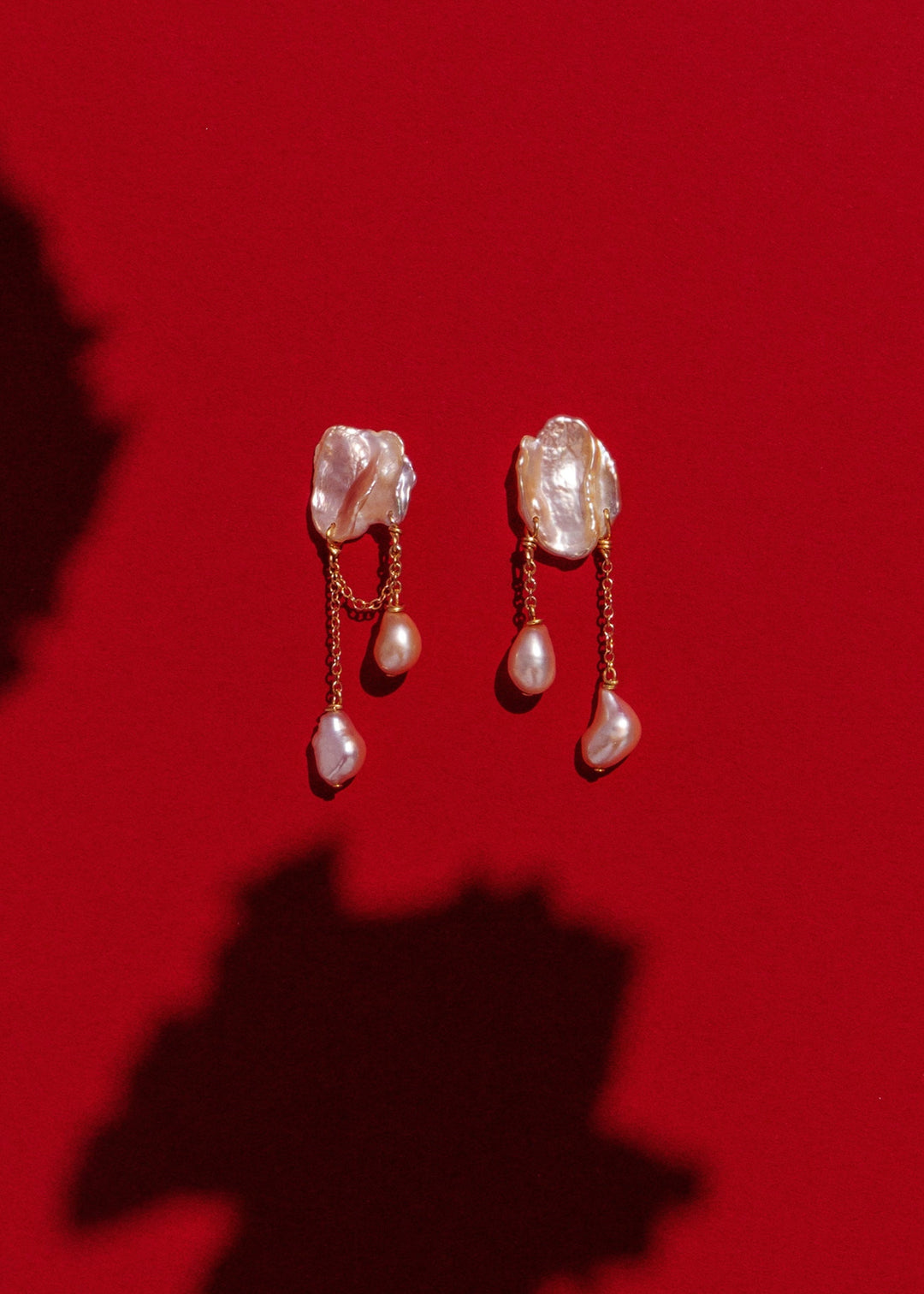 Solid gold earrings with keshi and baroque pearls