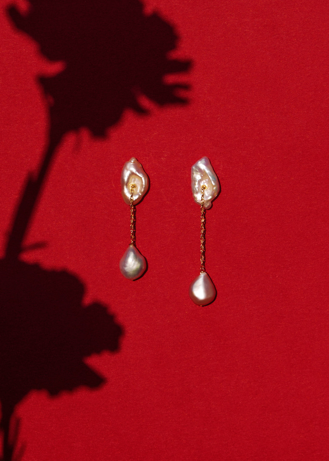 Solid gold earrings with keshi pearls and dangling baroque pearls