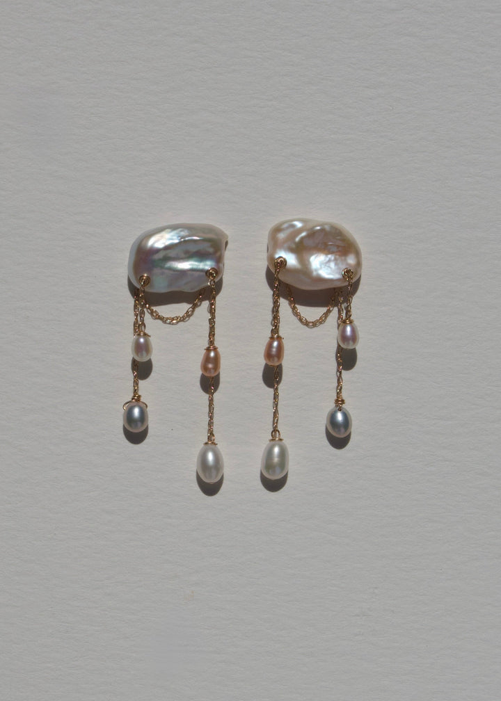 Dove earrings, keshi pearl studs with staggered gold chains and mixed pearl drops