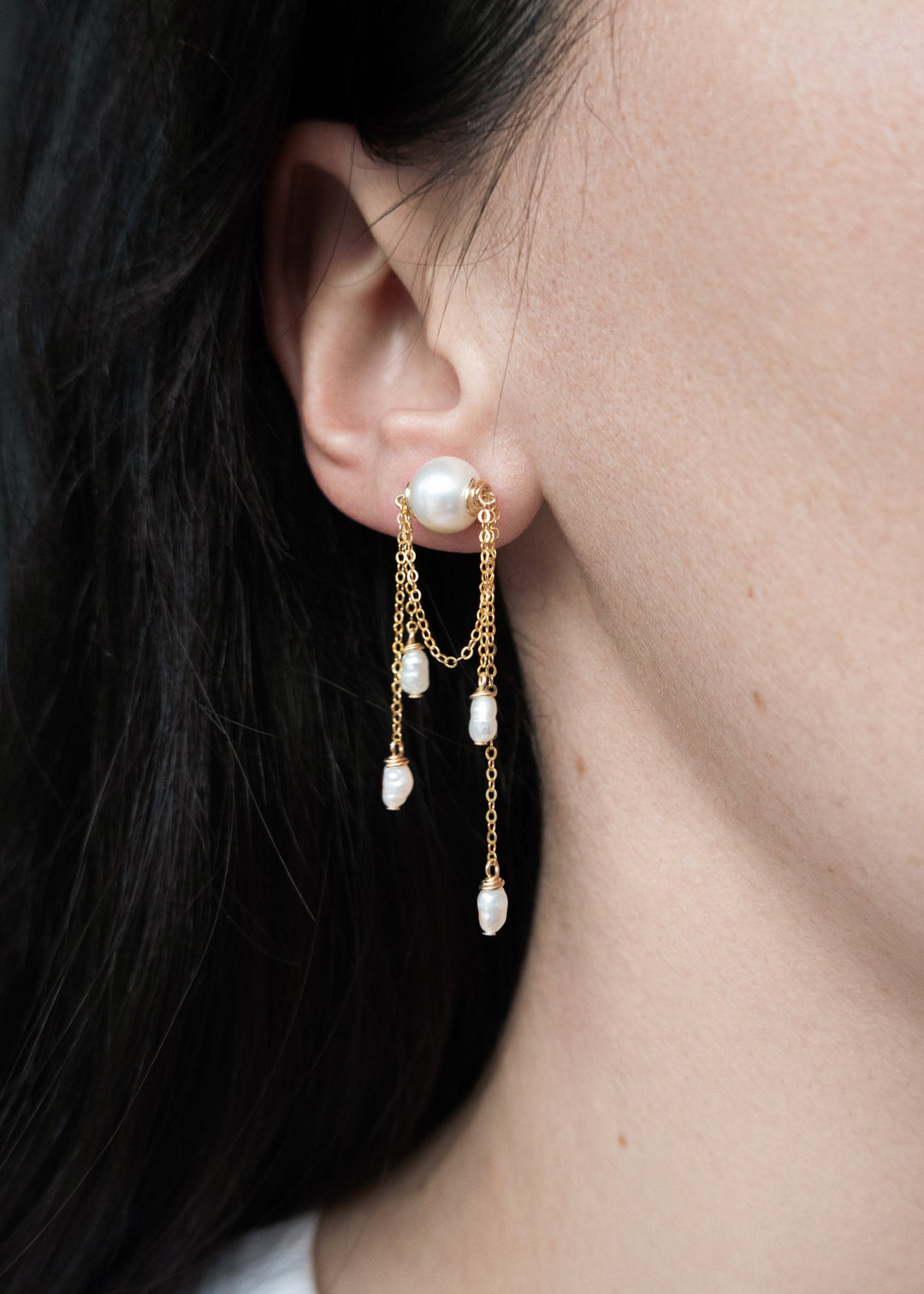 Unique earrings adorned with gold-filled wire and dainty pearls