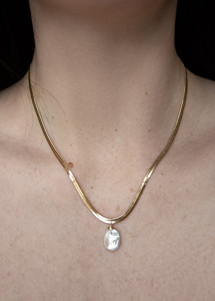 A large keshi pearl necklace with  sleeky solid gold chain