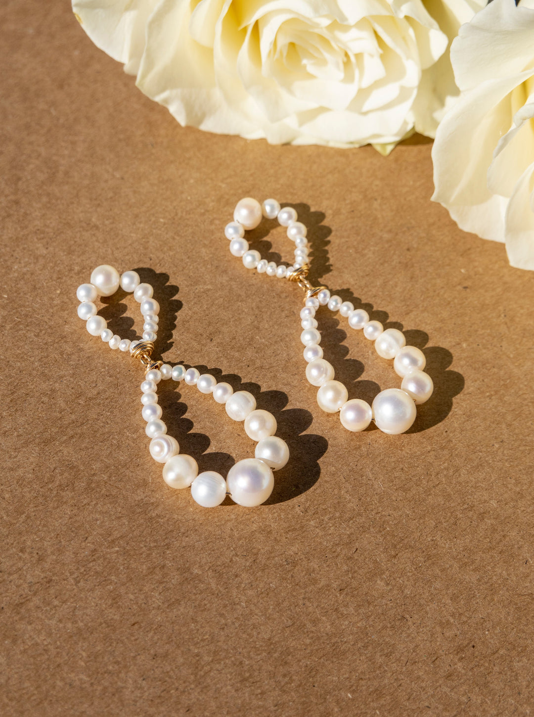 Double pearl Infinity hoop earrings