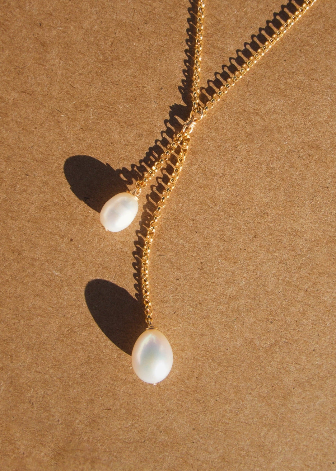 Gold-filled necklace with two different sized tear drop pearls