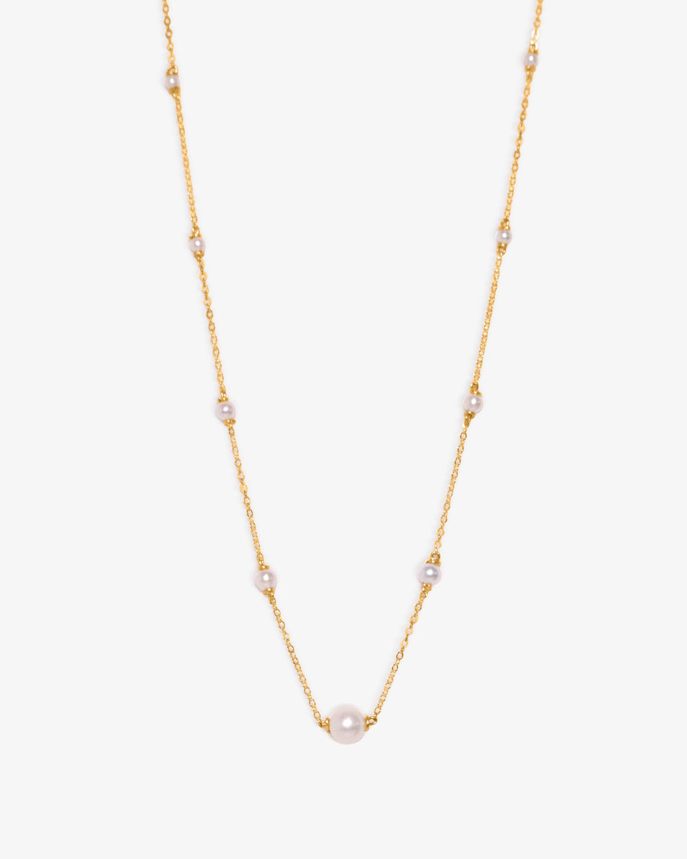 Gold necklace on a white background