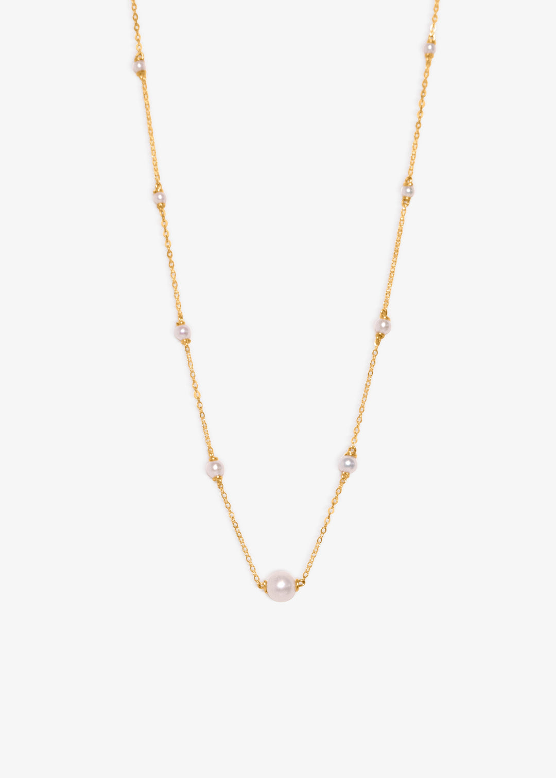Gold necklace on a white background