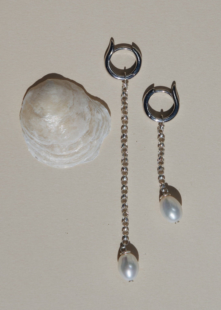 Single pearl earrings with sterling silver hoops and chains