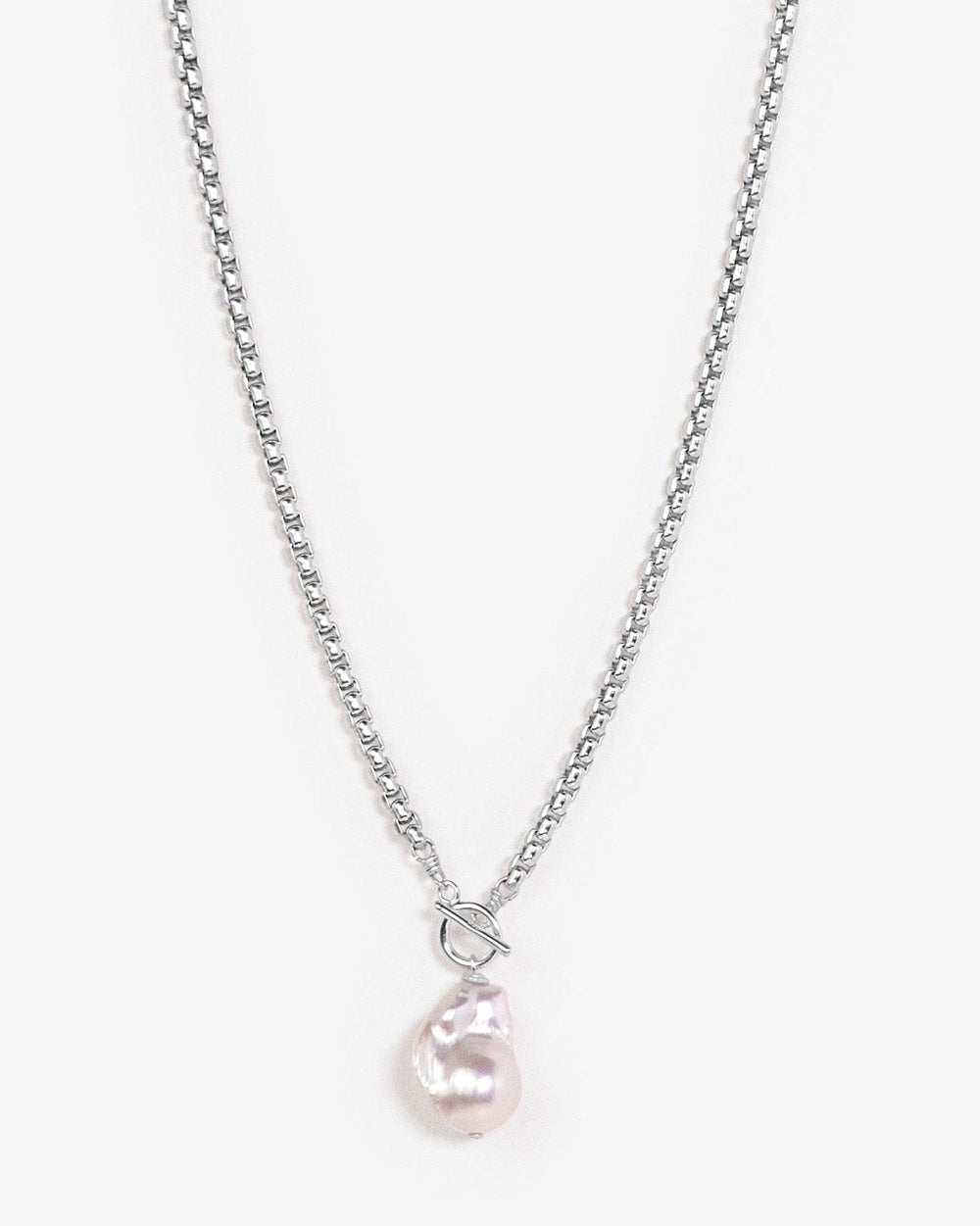 London Necklace - A standout necklace that commands attention. Made with a thick rounded box chain, a toggle clasp, and a single substantial baroque pearl, you'll never want to take this piece off. Sterling Silver Tarnish-Resistant & Hypoallergenic AAA Gr