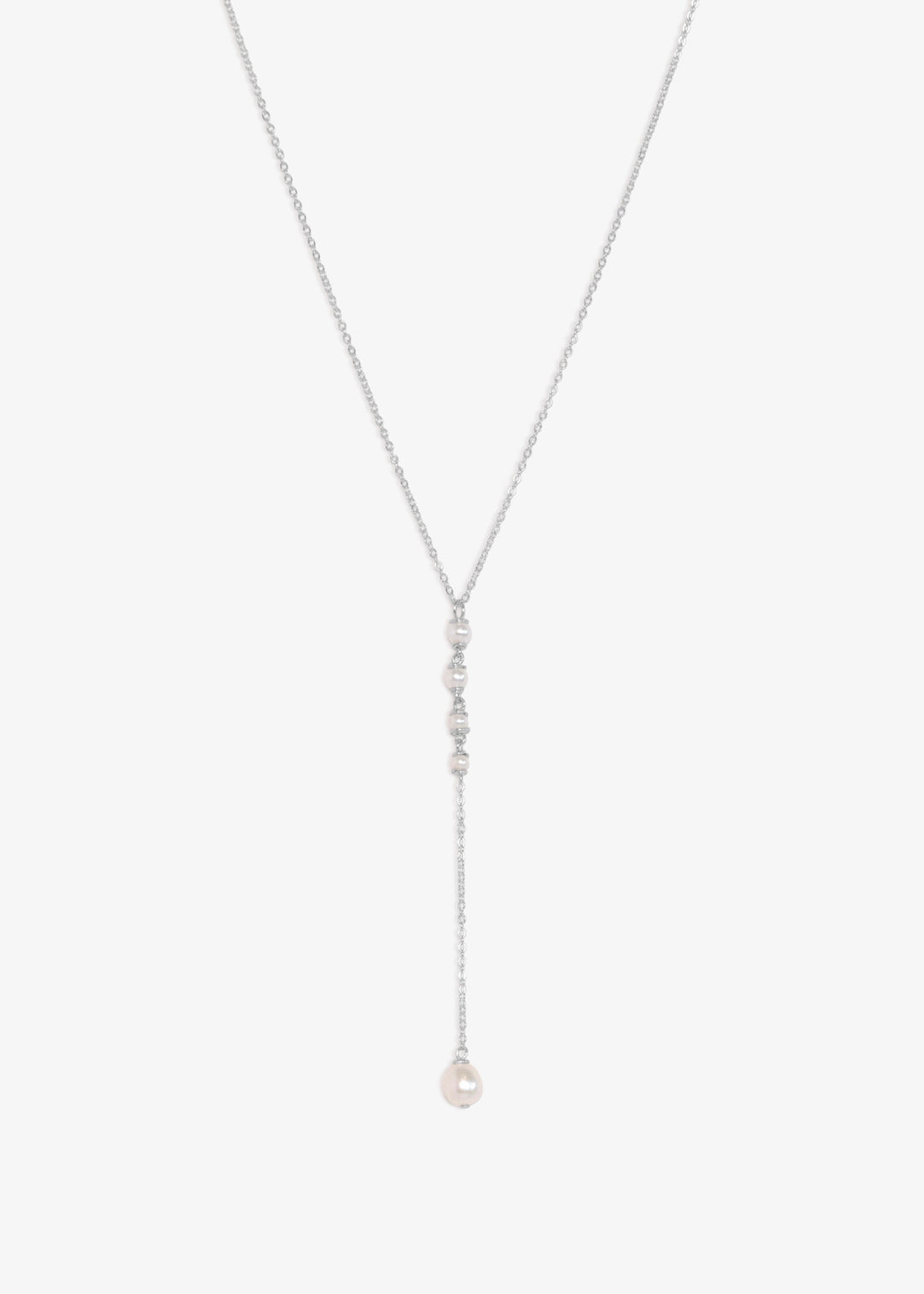 Lucine Necklace - A delicate choker lariat featuring four tiny seed pearls that taper from large to small, finished with a single teardrop pearl at the end. Crafted on a reflective chain, the Lucine balances elegance with an understated edge. 14K Gold-Fil