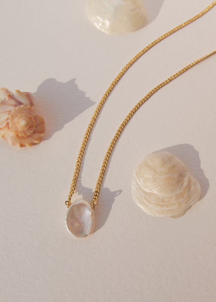 Gold-filled choker with a large keshi pearl pendant