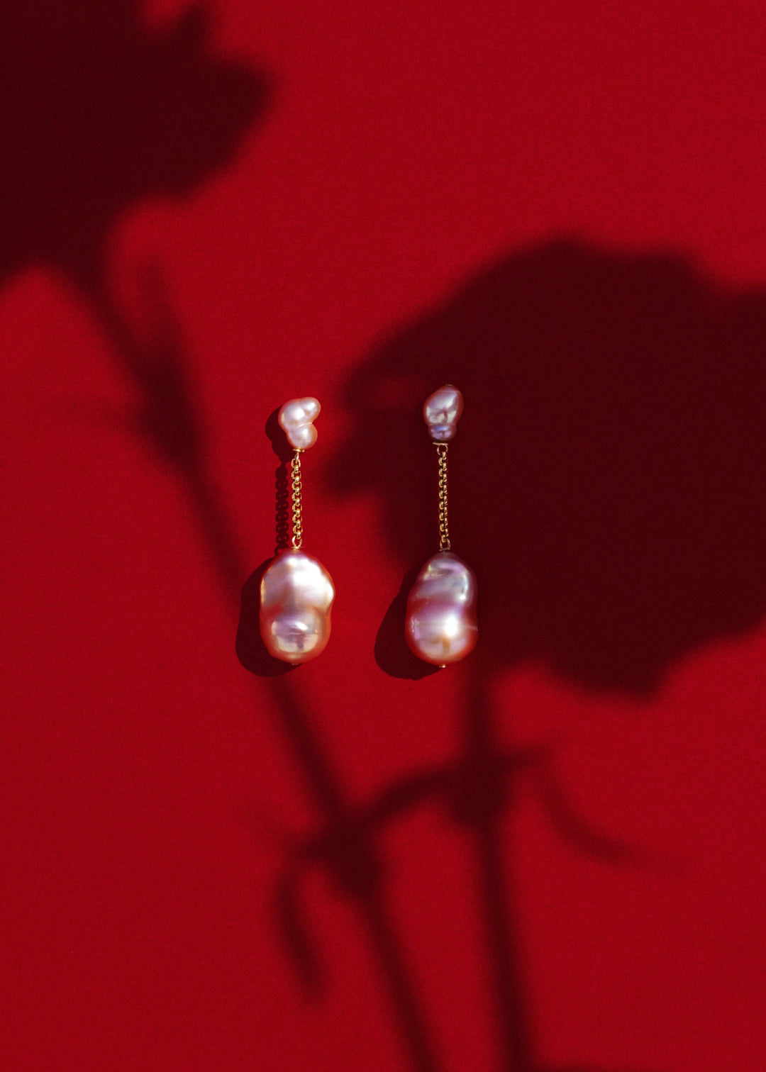 Lyra - Suspended from a delicate round box chain, luminous pink baroque pearls bring a touch of soft sophistication. Their irregular forms catch the light beautifully, celebrating individuality in every detail. 14K Solid Gold Pink Freshwater Baroque Pearl