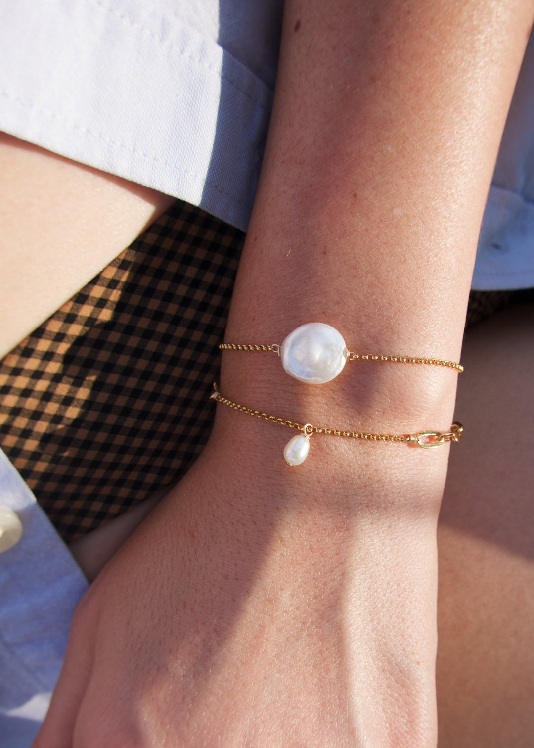 Two gold-filled bracelets with a teardrop pearl and a coin pearl