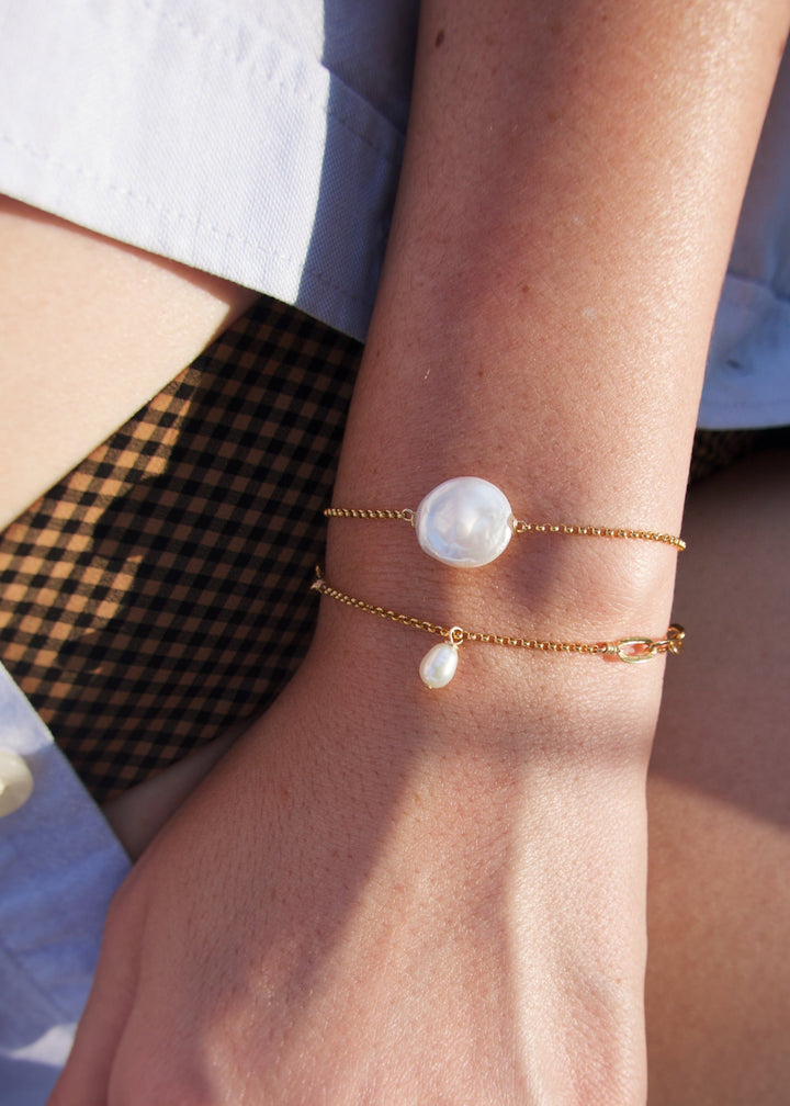 Two gold-filled bracelets with a teardrop pearl and a coin pearl