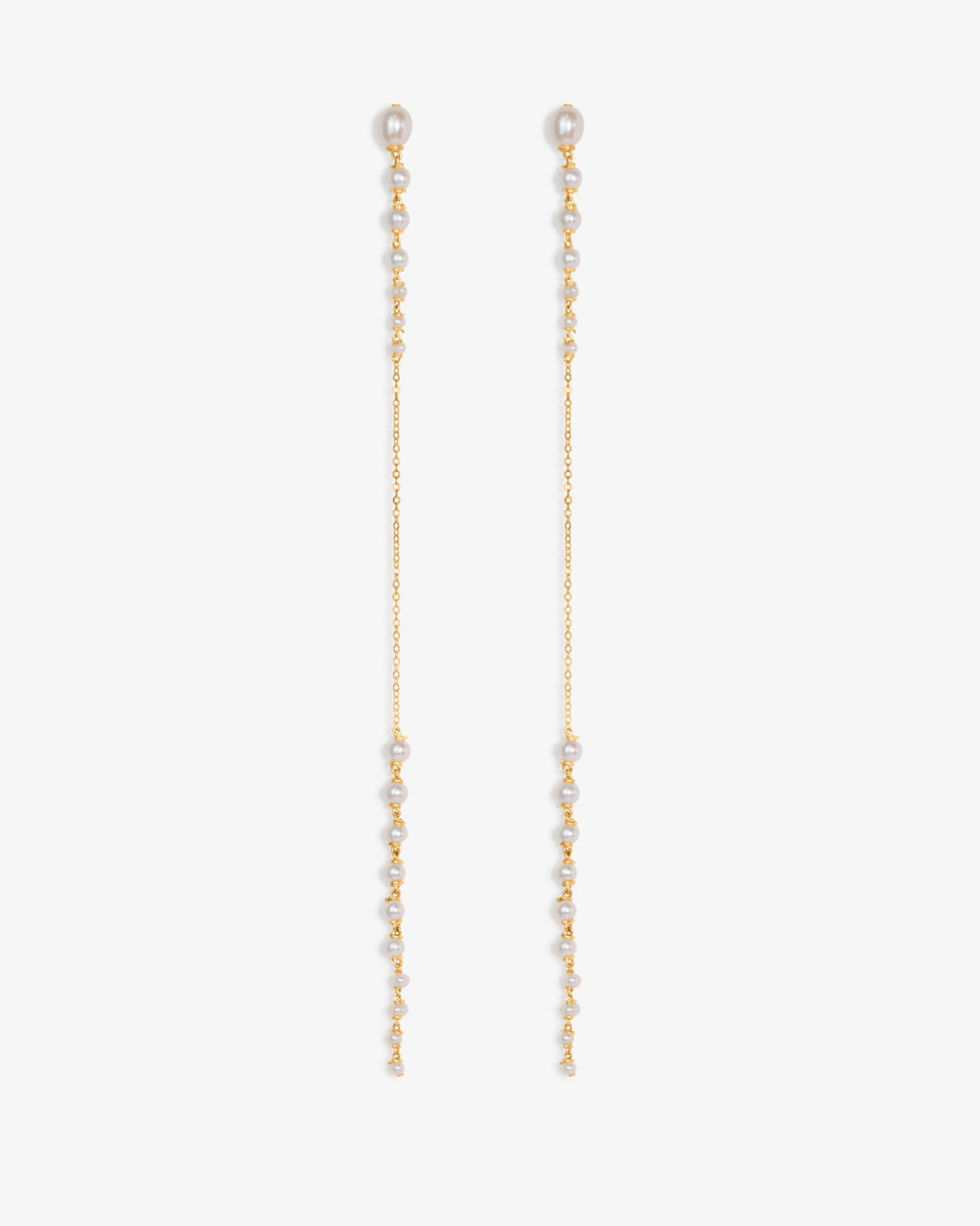 Posy - Minimal by design, but quietly captivating. These long earrings feature tapered strands of seed pearls, graduating from large to small, framing a single, reflective chain at the center. The effect is delicate yet striking, with just enough shimmer