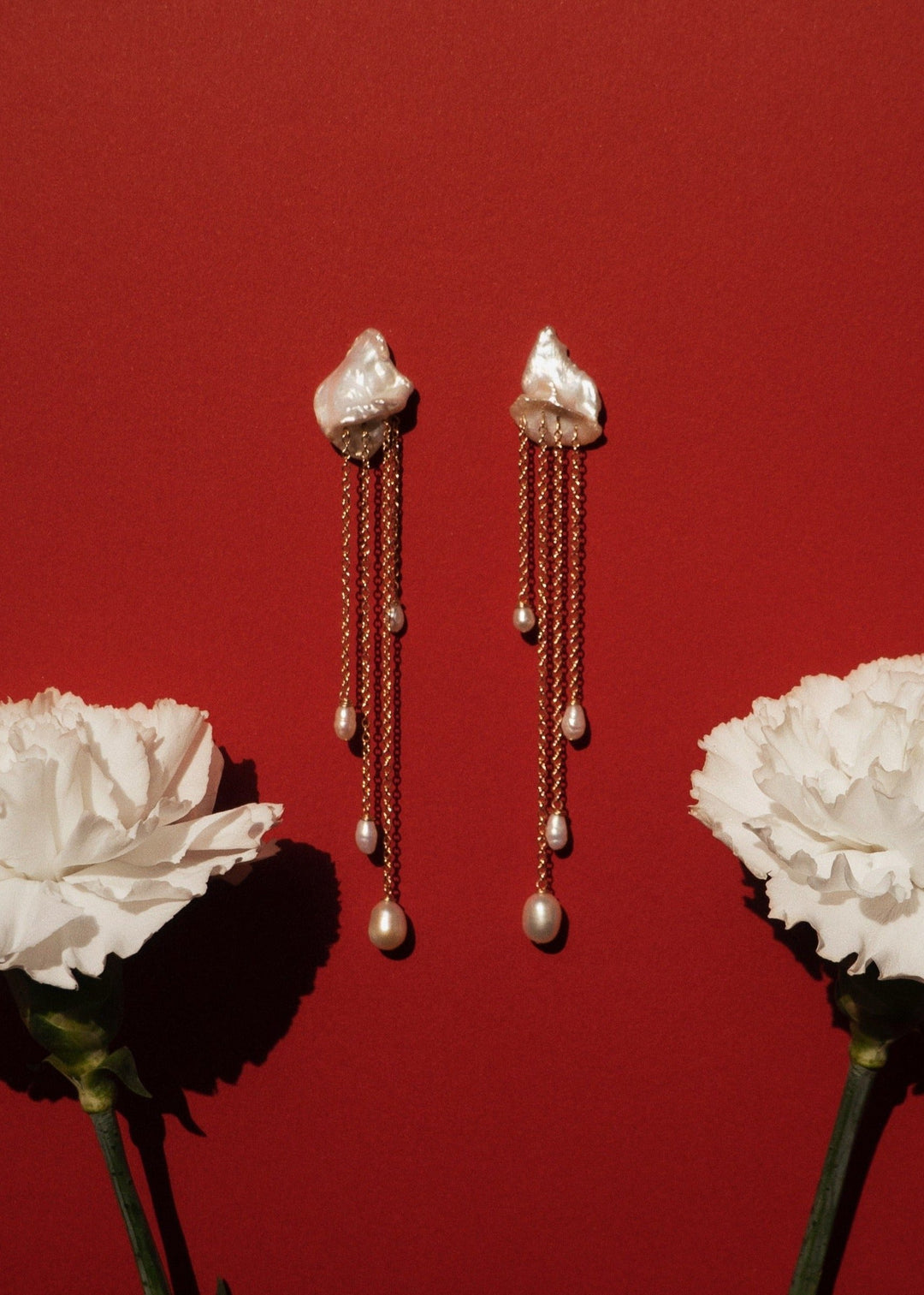 Keshi Pearl earrings with 4 long pearl drop chains