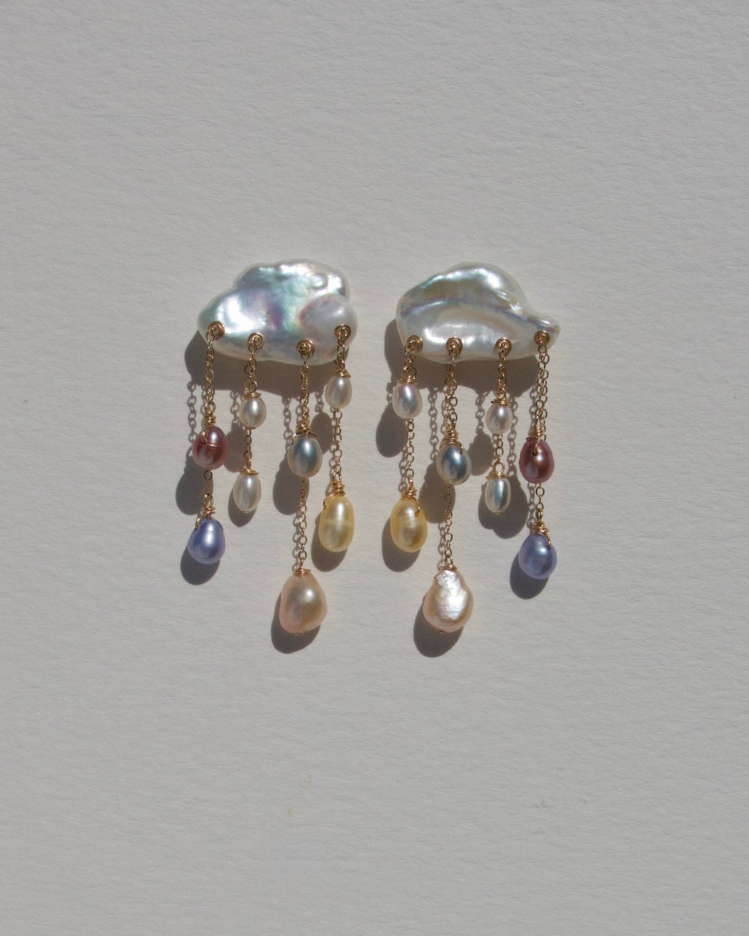Rainstorm earrings, large pearl clouds with colorful pearl drops on gold chains
