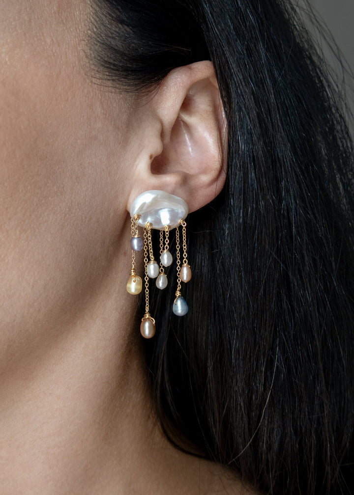 Rainstorm earrings worn on a model&