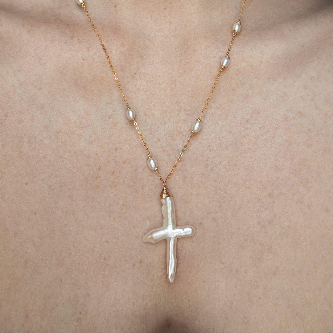 Gold-filled chain with dainty pearls and a baroque cross pearl pendant
