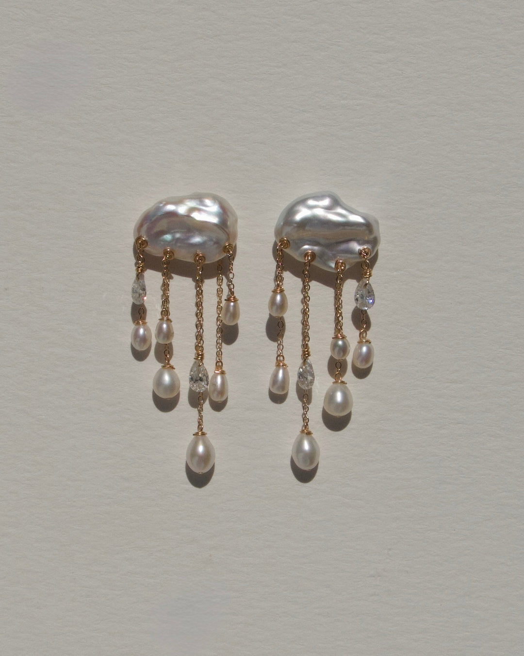 Skylight earrings, white keshi pearls with diamond and pearl drops on gold chains