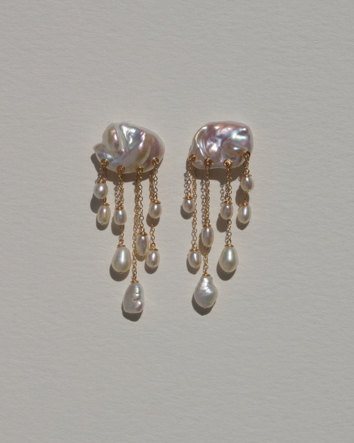 Snowfall earrings, white keshi pearls with cascading gold chains and white pearl drops