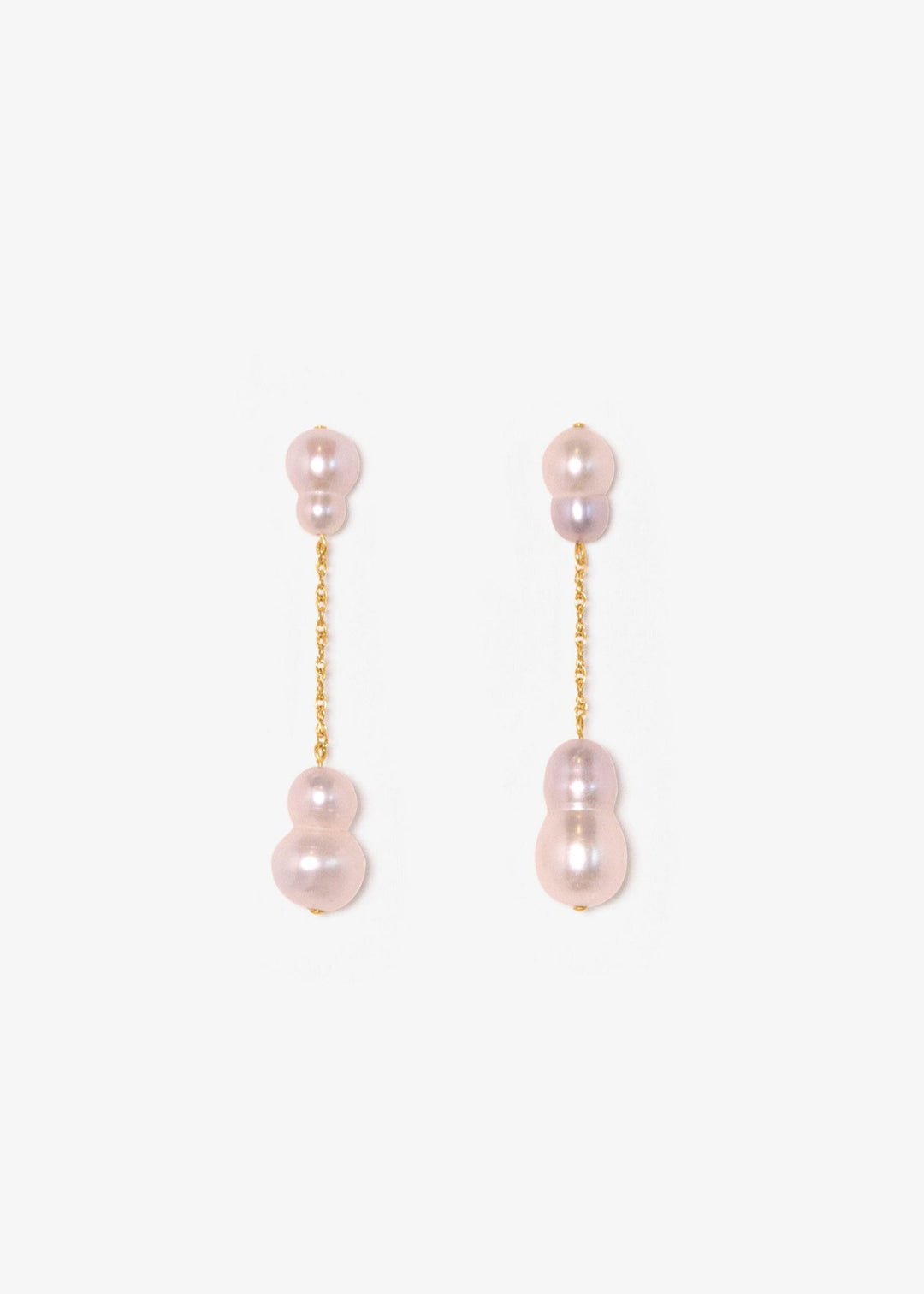 Stella - Suspended from a delicate rope chain, these white and silver baroque pearls bring a touch of soft sophistication. Their irregular forms catch the light beautifully, celebrating individuality in every detail. 14K Solid Gold Freshwater Baroque pear