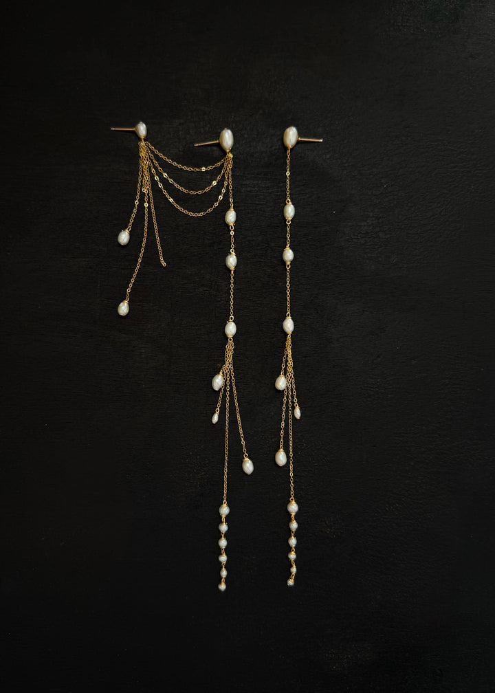 Sueño - Whether you have multiple piercings or just one, these are the earrings you’ve likely dreamed of. Dainty and delicate, yet anything but understated—they sway softly and catch every bit of light. Designed to be worn on either ear, with a cuff versi