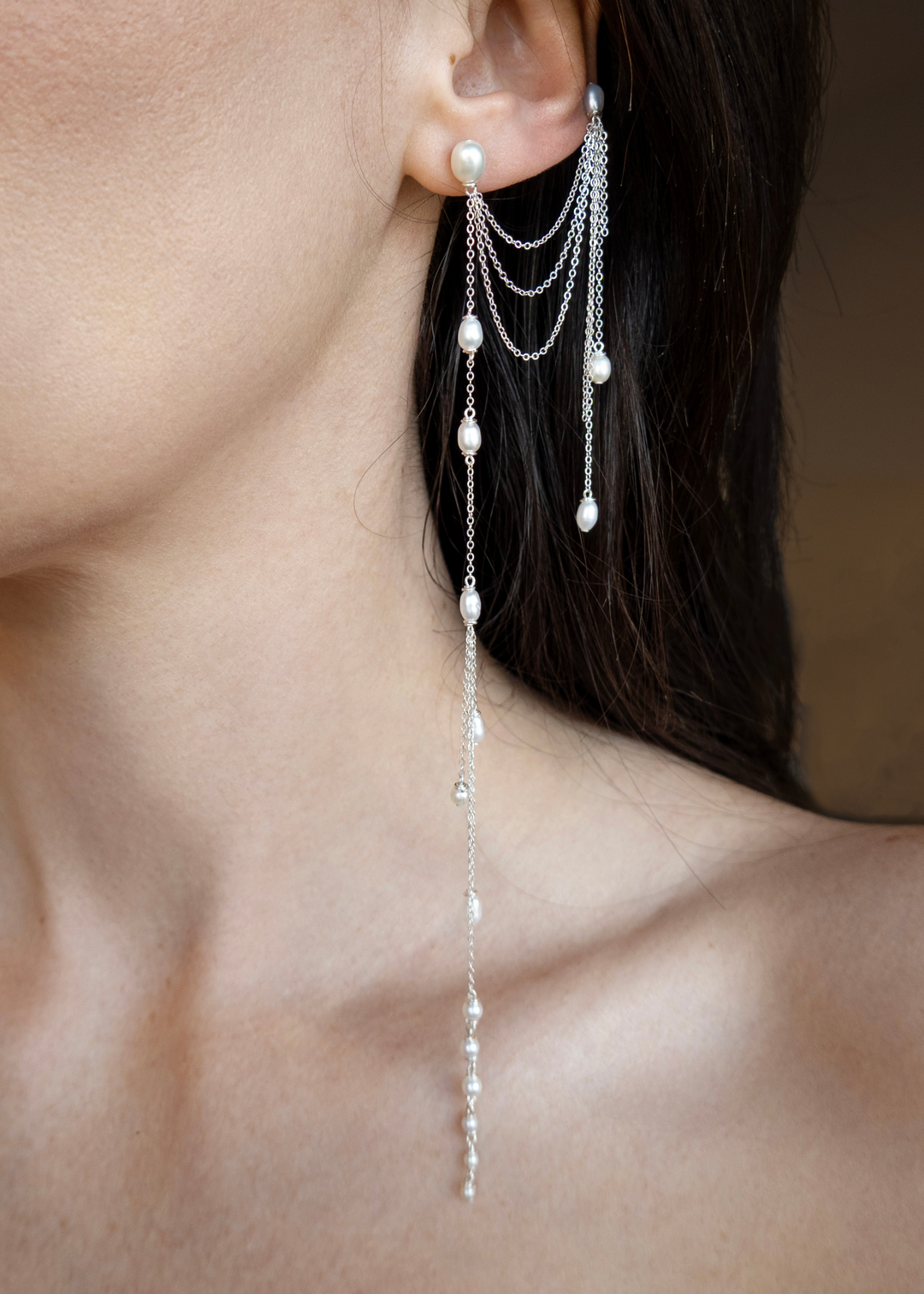 Sueño - Whether you have multiple piercings or just one, these are the earrings you’ve likely dreamed of. Dainty and delicate, yet anything but understated—they sway softly and catch every bit of light. Designed to be worn on either ear, with a cuff versi