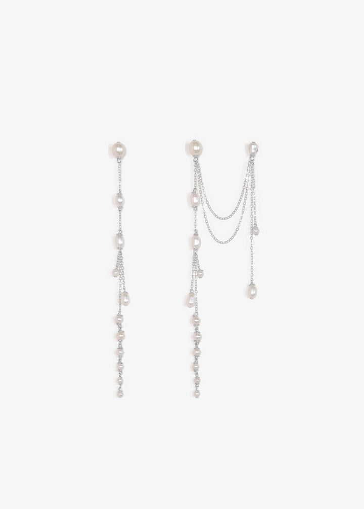 Sueño Petite - Whether you wear one piercing or a few, these are the earrings you didn’t know you needed. Smaller in scale but just as luminous, the petite version sways gently and catches the light with every turn. Designed to sit beautifully on either e