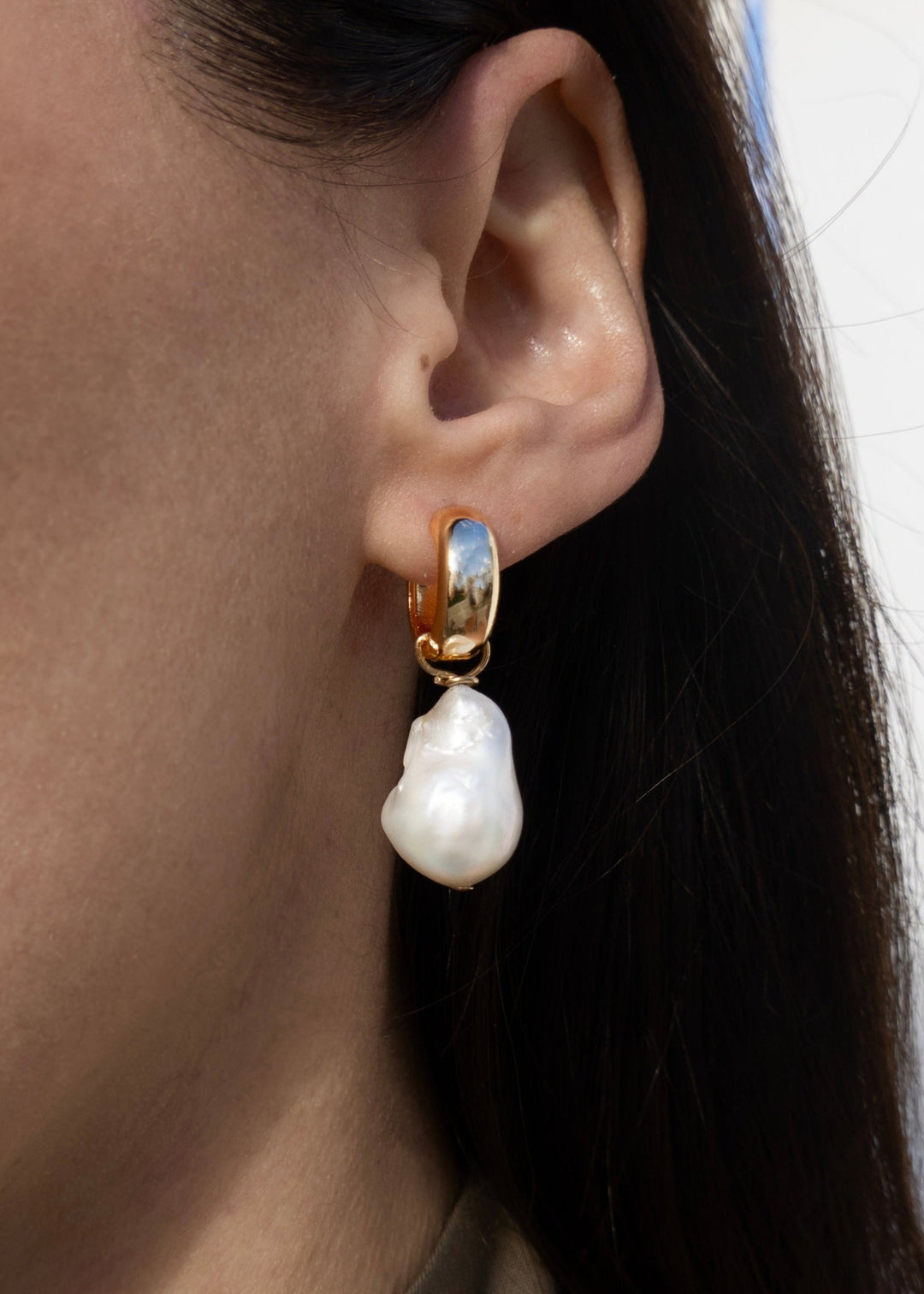 Gold-filled earrings with a large baroque pearl