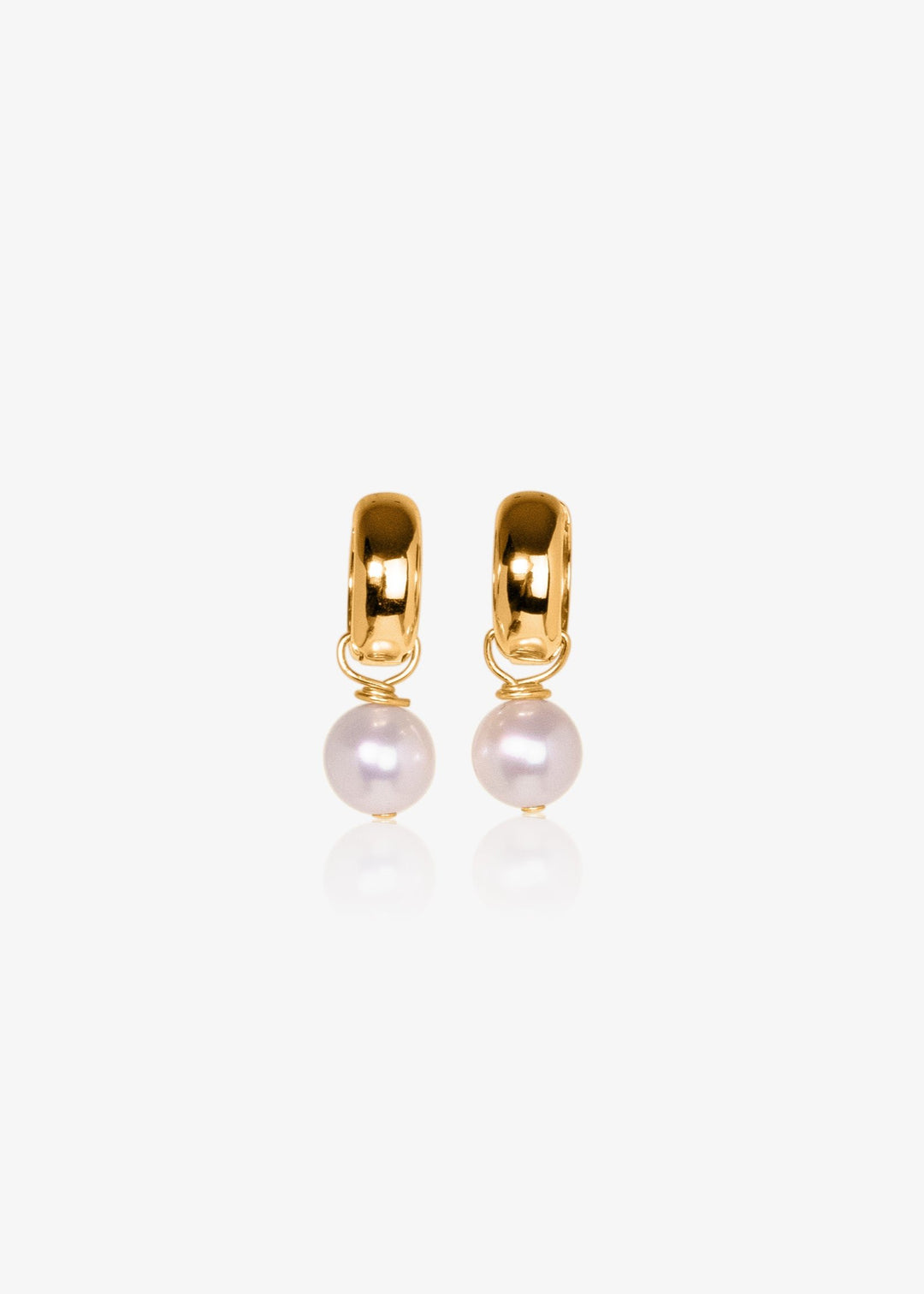 Earrings with gold-filled hoops and a small pearl