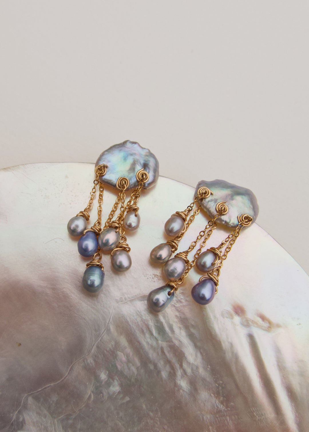 Gold-filled earrings with lustrous blue pearls