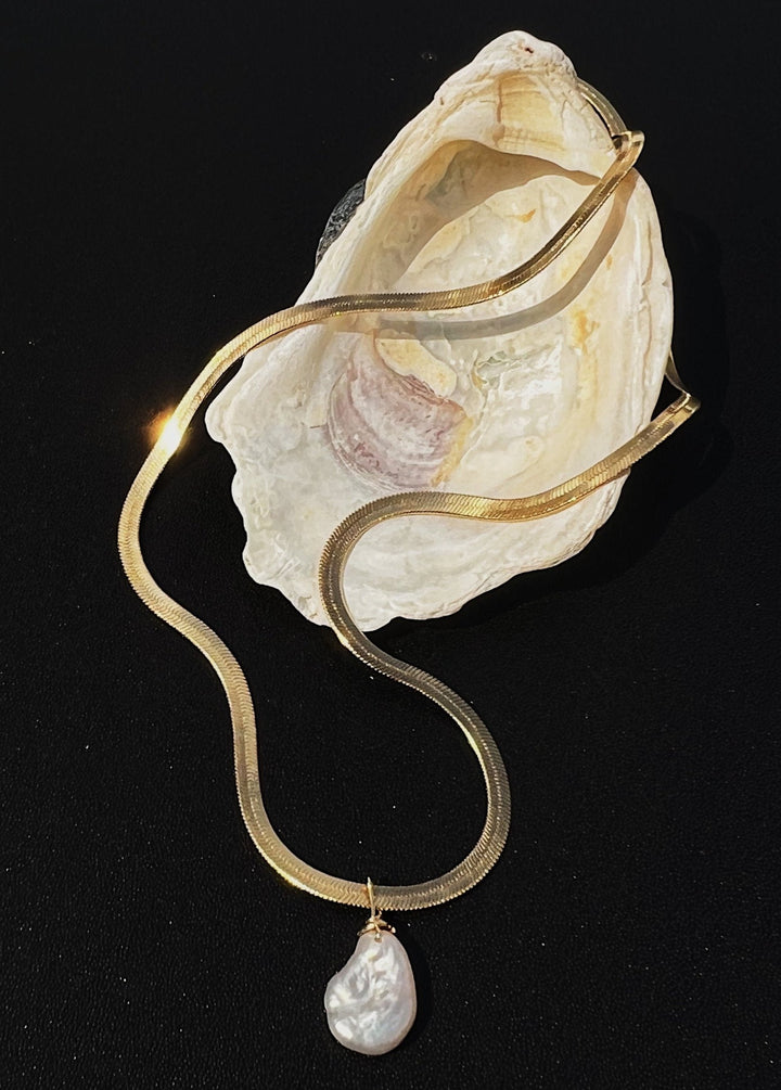 A large keshi pearl necklace with gold-filled sleeky chain